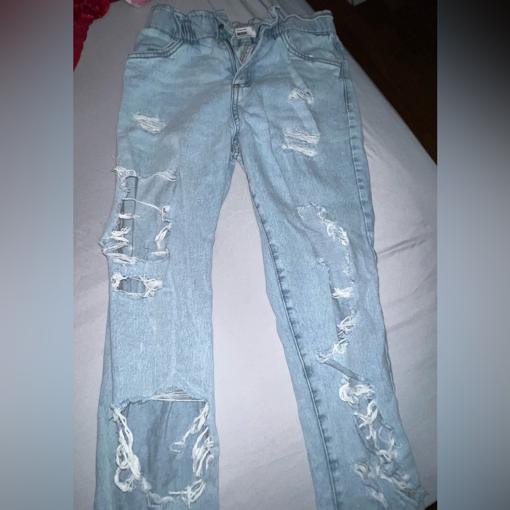 Light blue ripped jeans